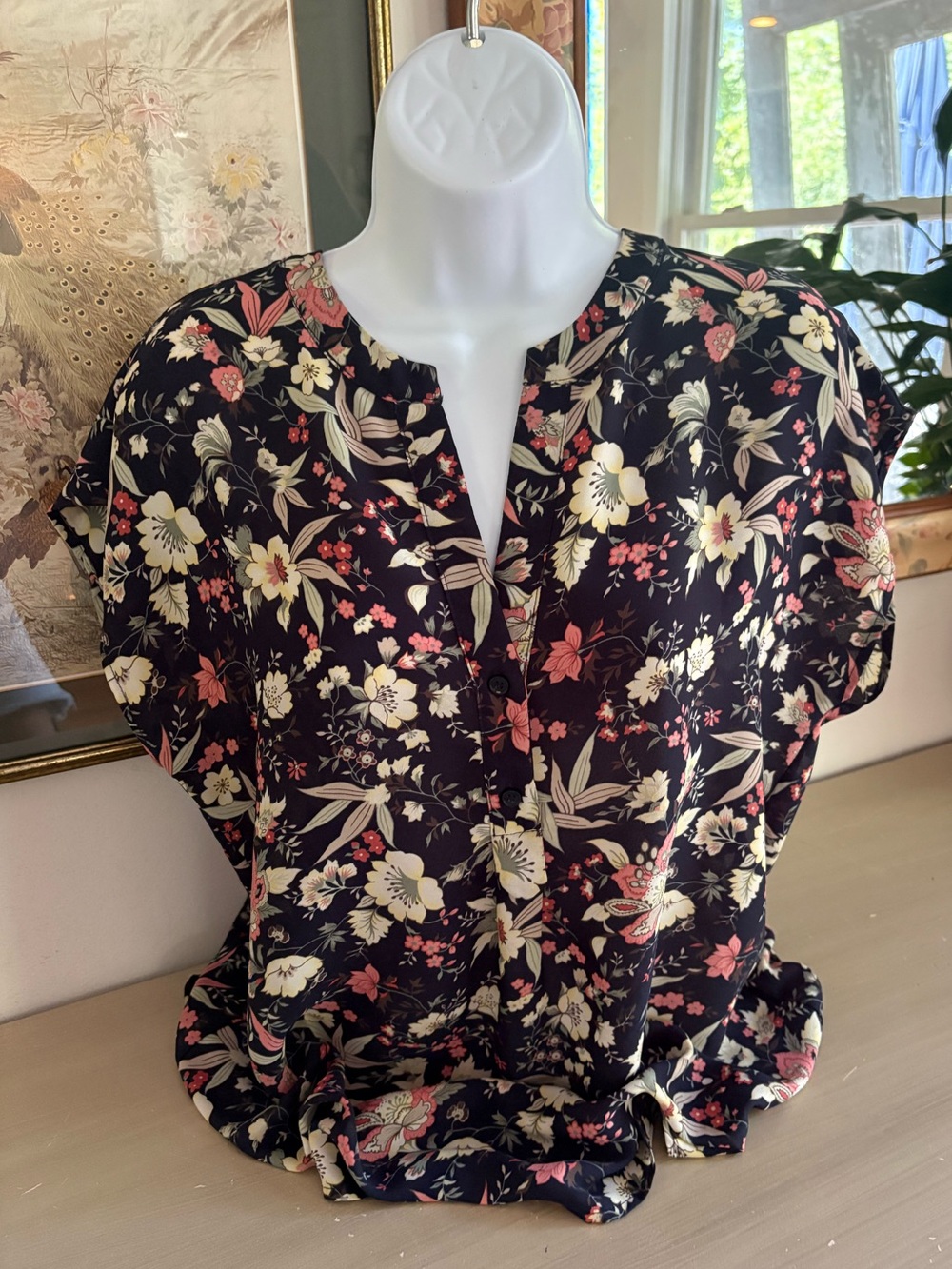Pleione brand blouse  split neck and a dark navy blue floral pattern